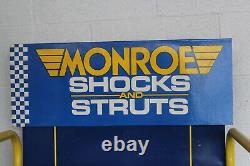 Présentoir en métal pour pièces d'auto Monroe Shocks et Struts avec étagère et enseigne